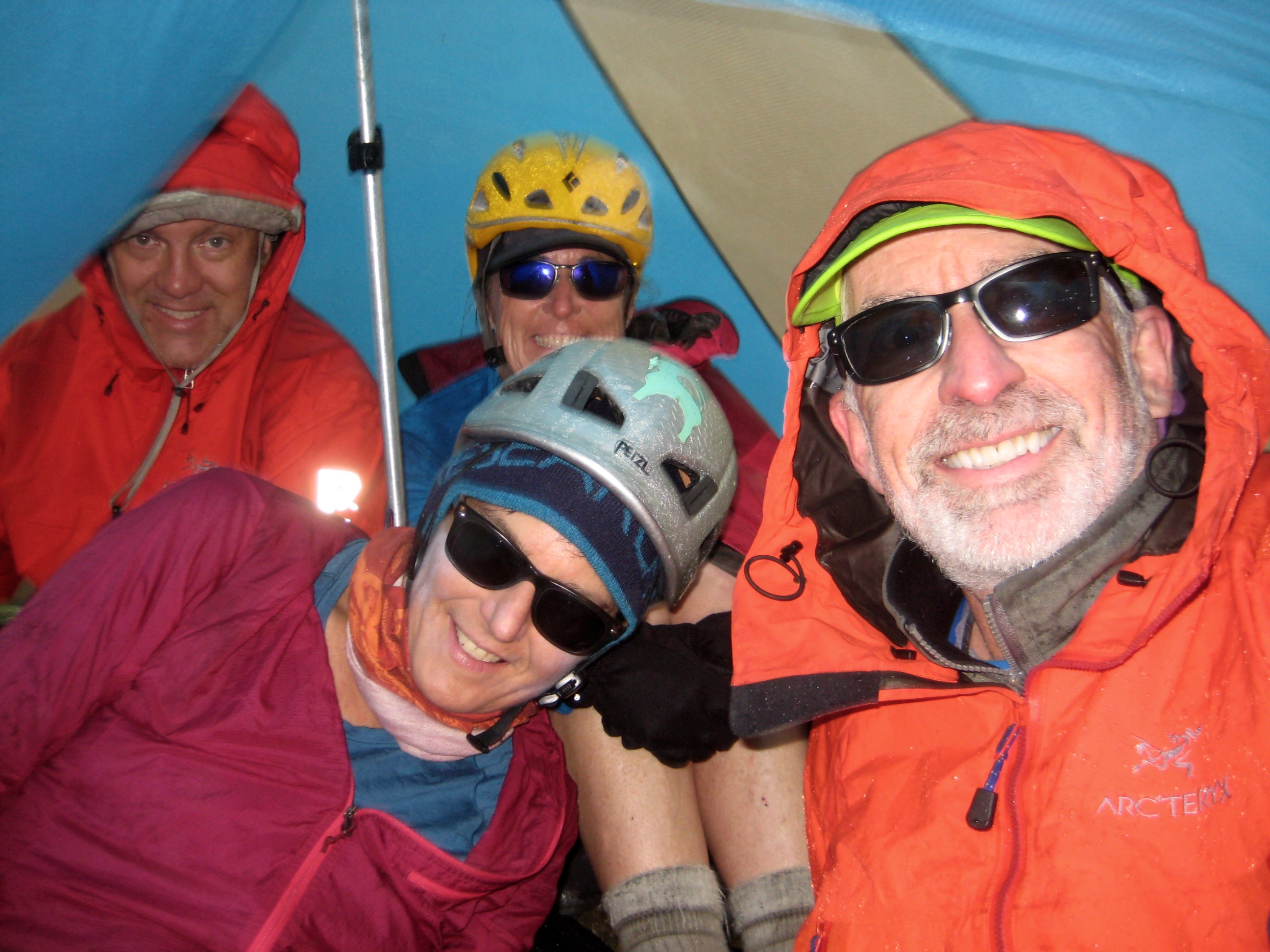 Selfie of mountain climbers tent bound at Borealis Pass on McAllister Traverse aka Inspiration Traverse in the North Cascades