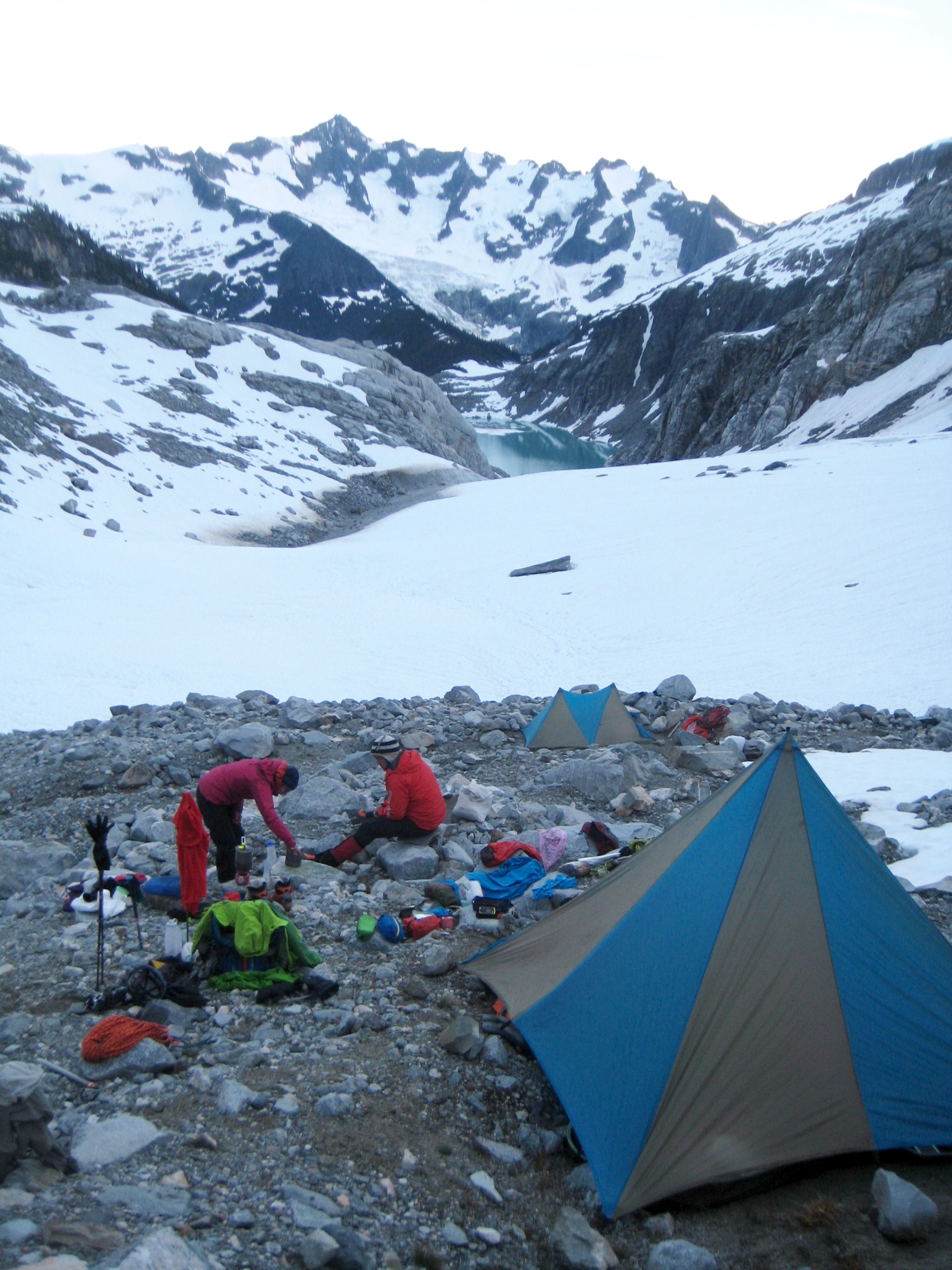 Mountain climber's camp on North Klawati Glacier moraine on McAllister Traverse aka Inspiration Traverse in the North Cascades