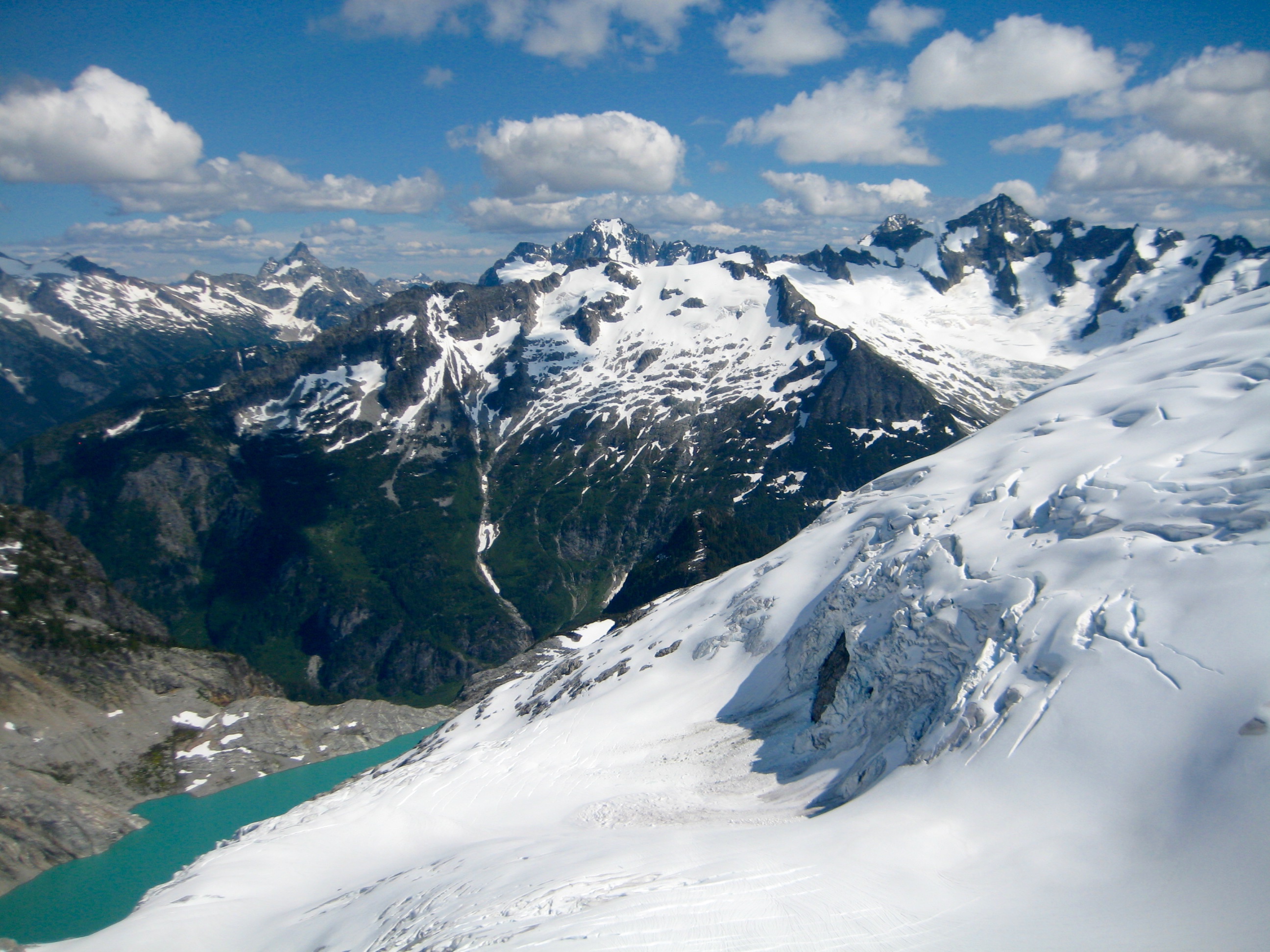 Mt Goode, Mt Buckner, and Forbidden Peak in the North Cascades as seen from North Klawatti Glacier along McAllister Traverse aka Inspiration Traverse