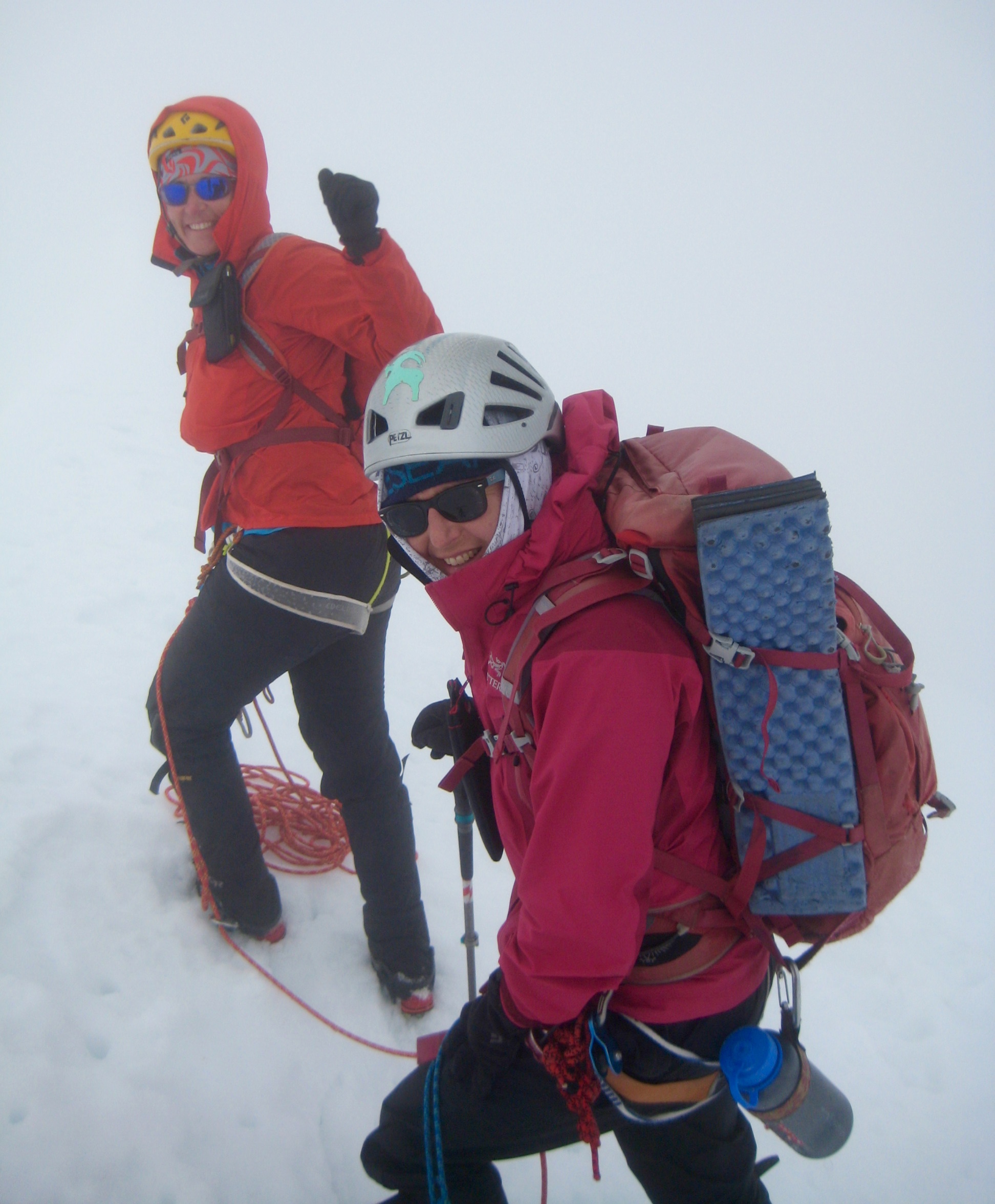 Mountain climbers in fog on summit of Eldorado Peak in the North Cascades
