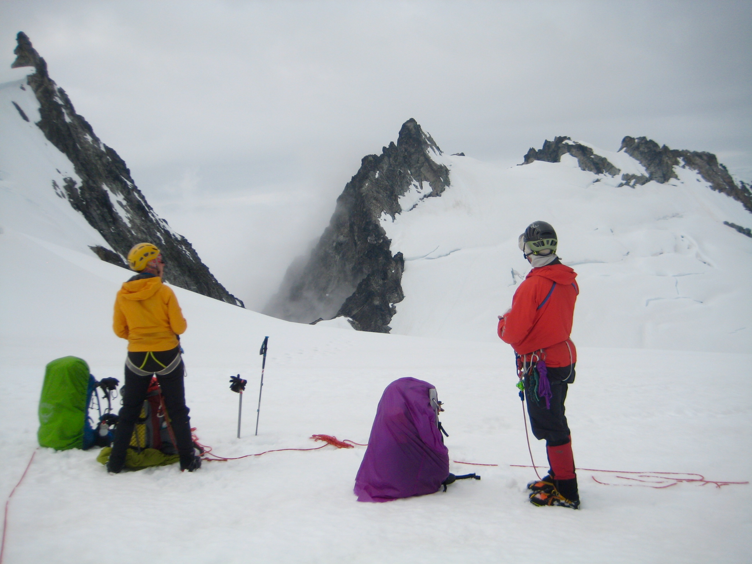 Mountain climbers taking a break above Dorado Col and start of Isolation Traverse as seen from Tepeh Gap