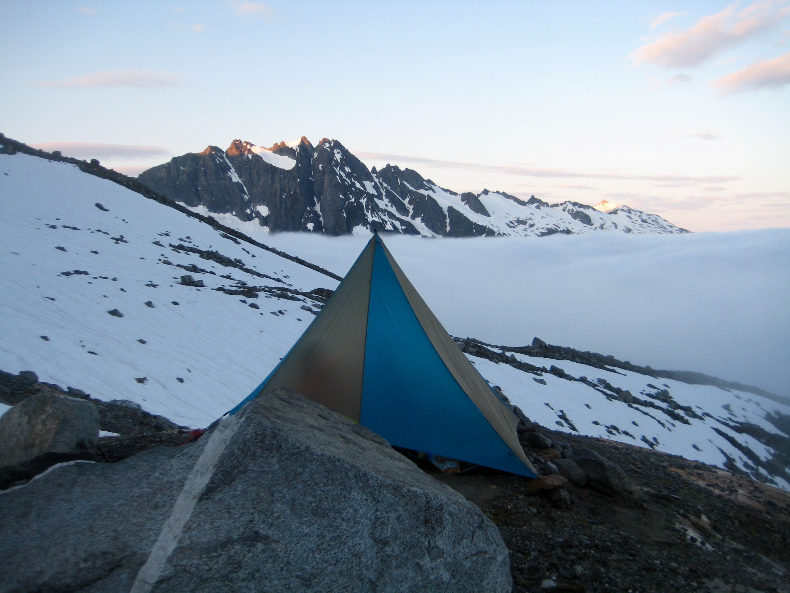 mountain climber's tent and morning sun on The Triad on McAllister Traverse aka Isolation Traverse