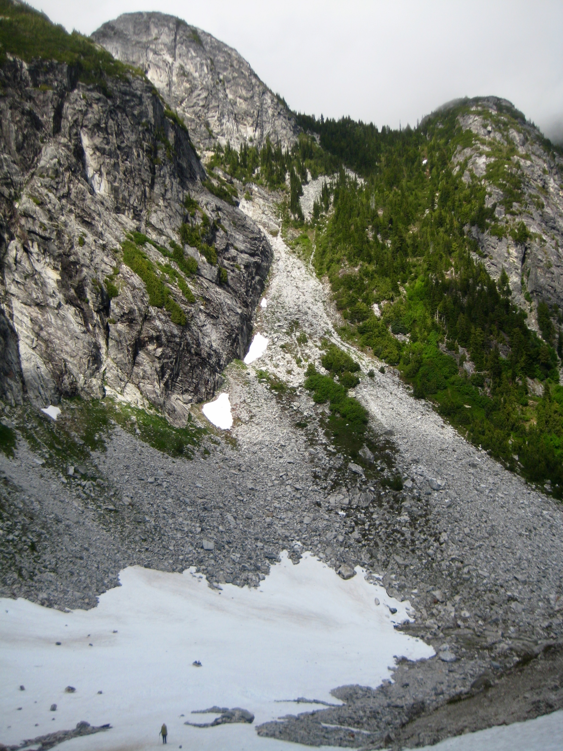 Looking across Rock Couloir to Wilcox Pass as seen from Coccyx Snow Chute along McAllister Traverse aka Isolation Traverse