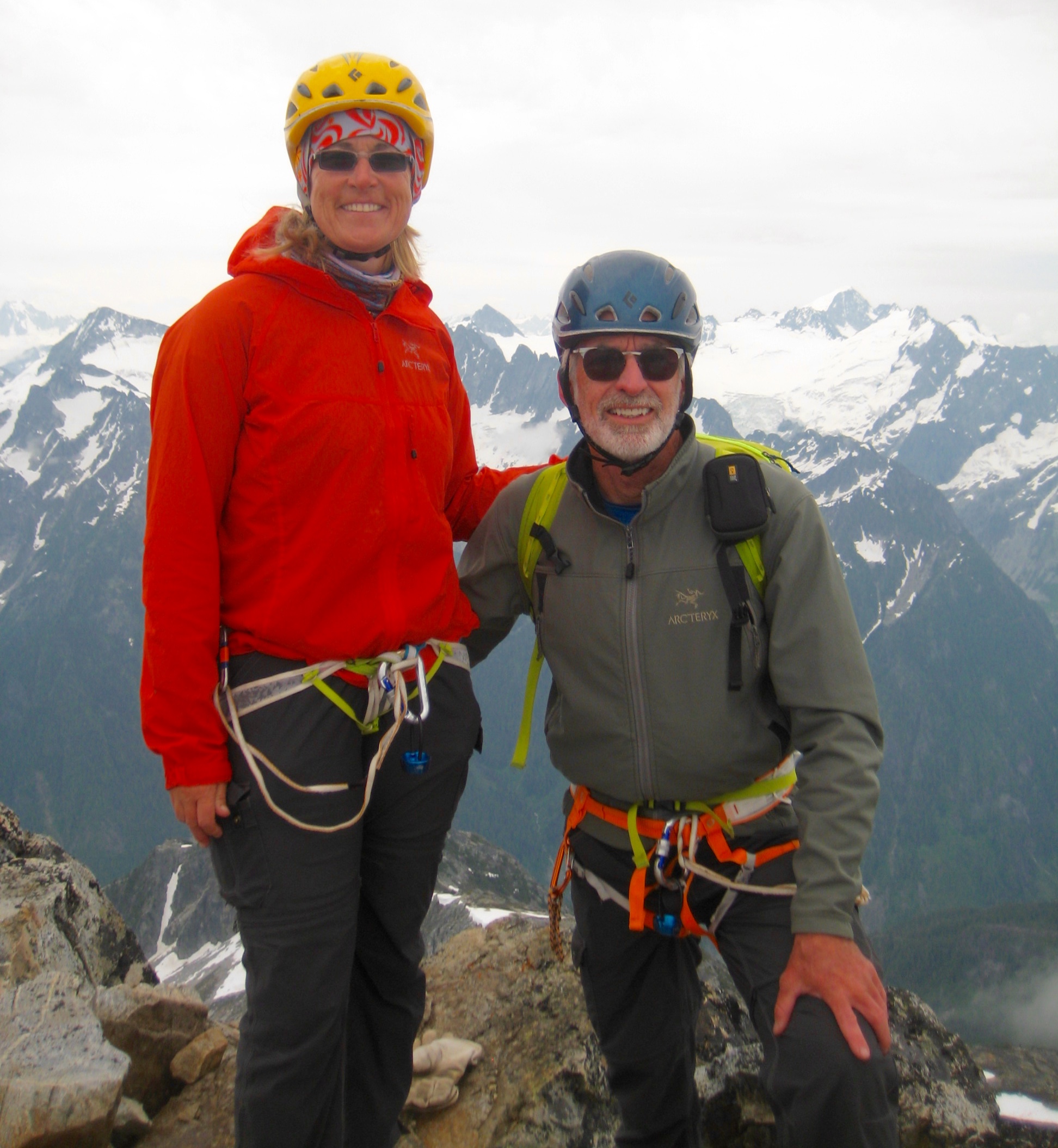 Eileen and Jim on Snowfield Peak Summit with Inspiration Traverse in background