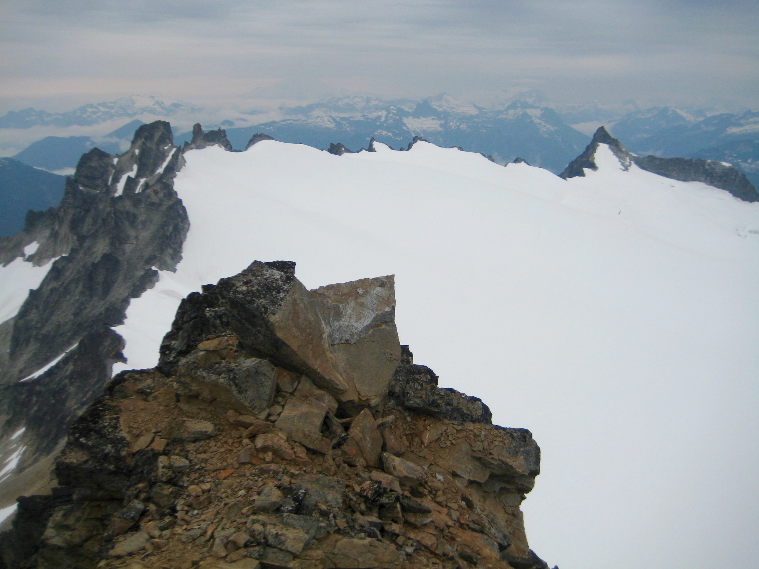 The Horseman and The Needle above glacier from Snowfield Peak Summit