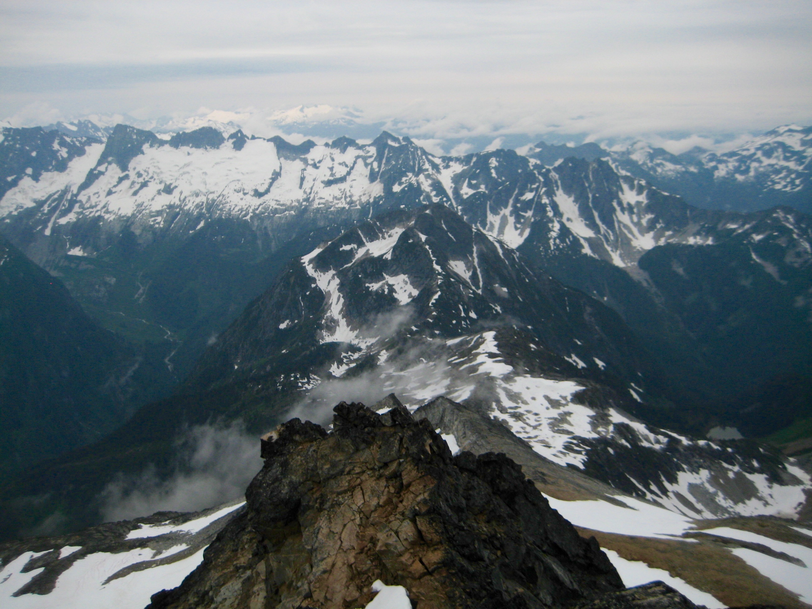 Backbone Ridge and Isolation Peak in the North Cascades as seen from the summit of Snowfield Peak along the Isolation Traverse