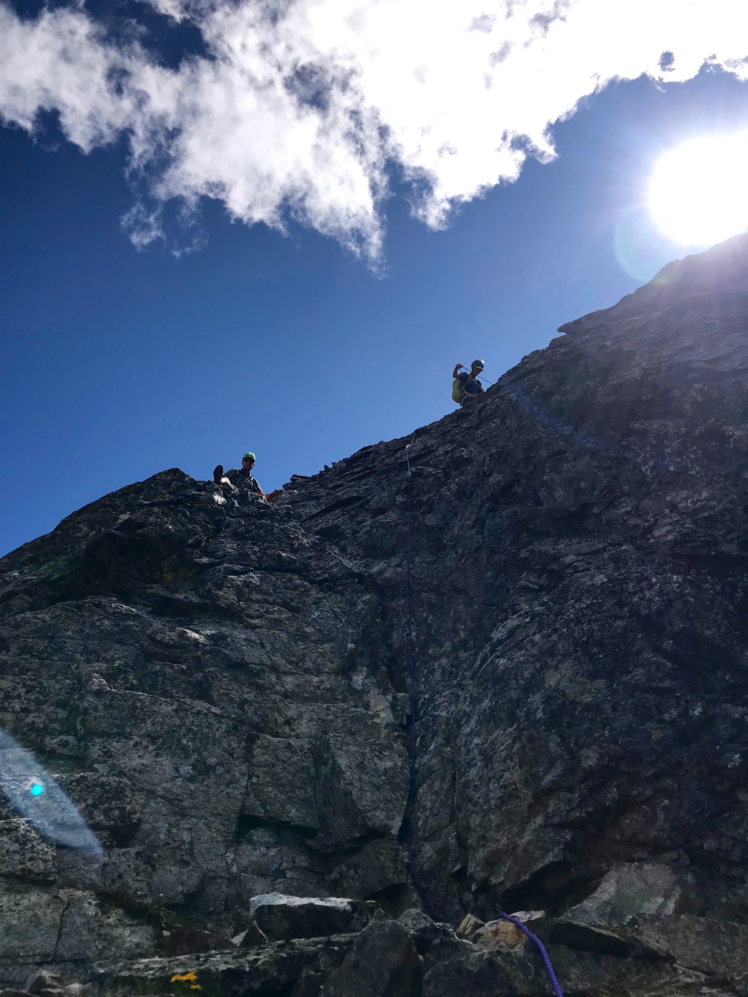 climbers standing on Top Of Dihedral on the West Ridge of Fisher Peak