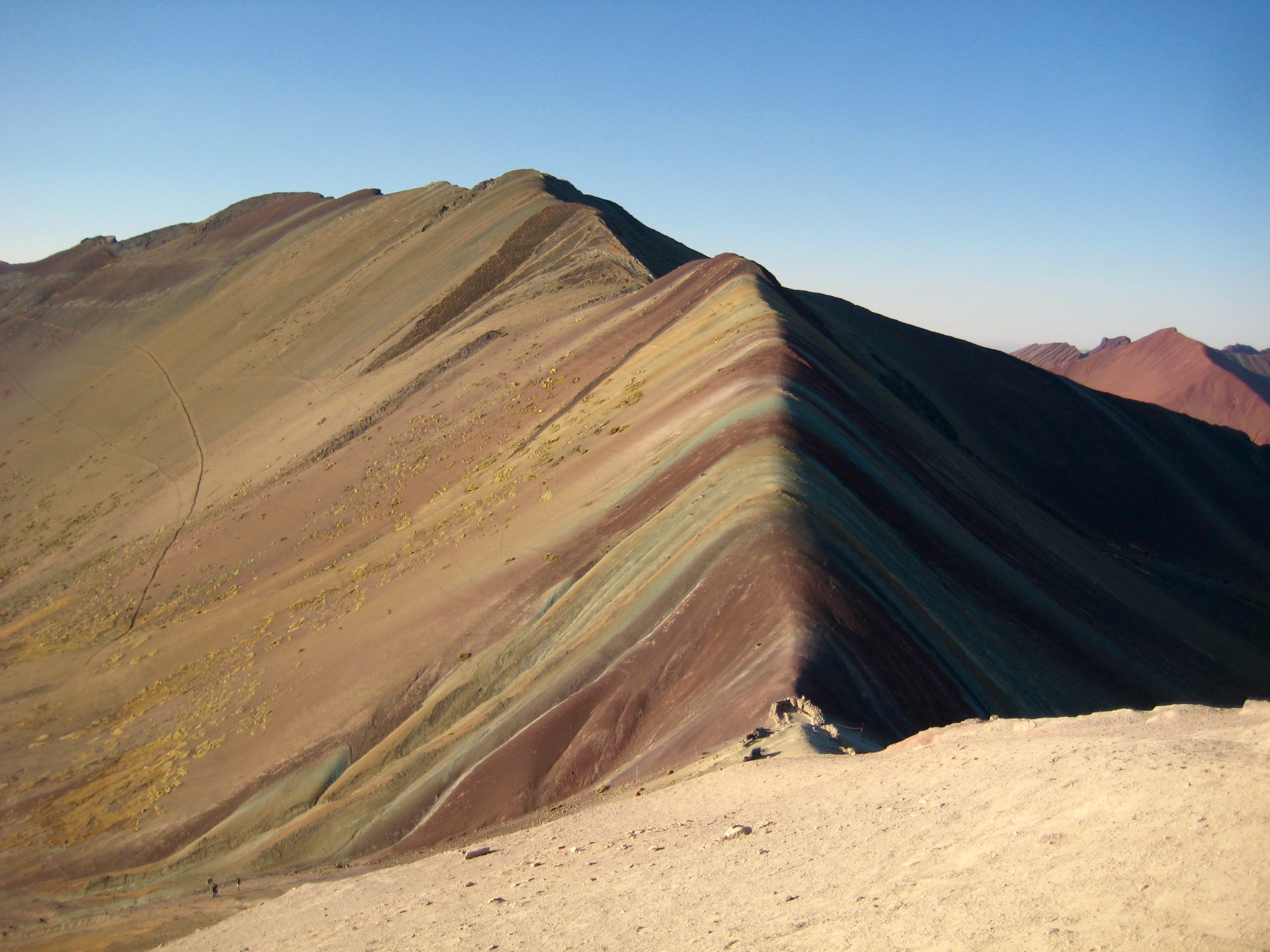 Morning light on Rainbow Mountain in the Cordillera Vilcanota region of Peru