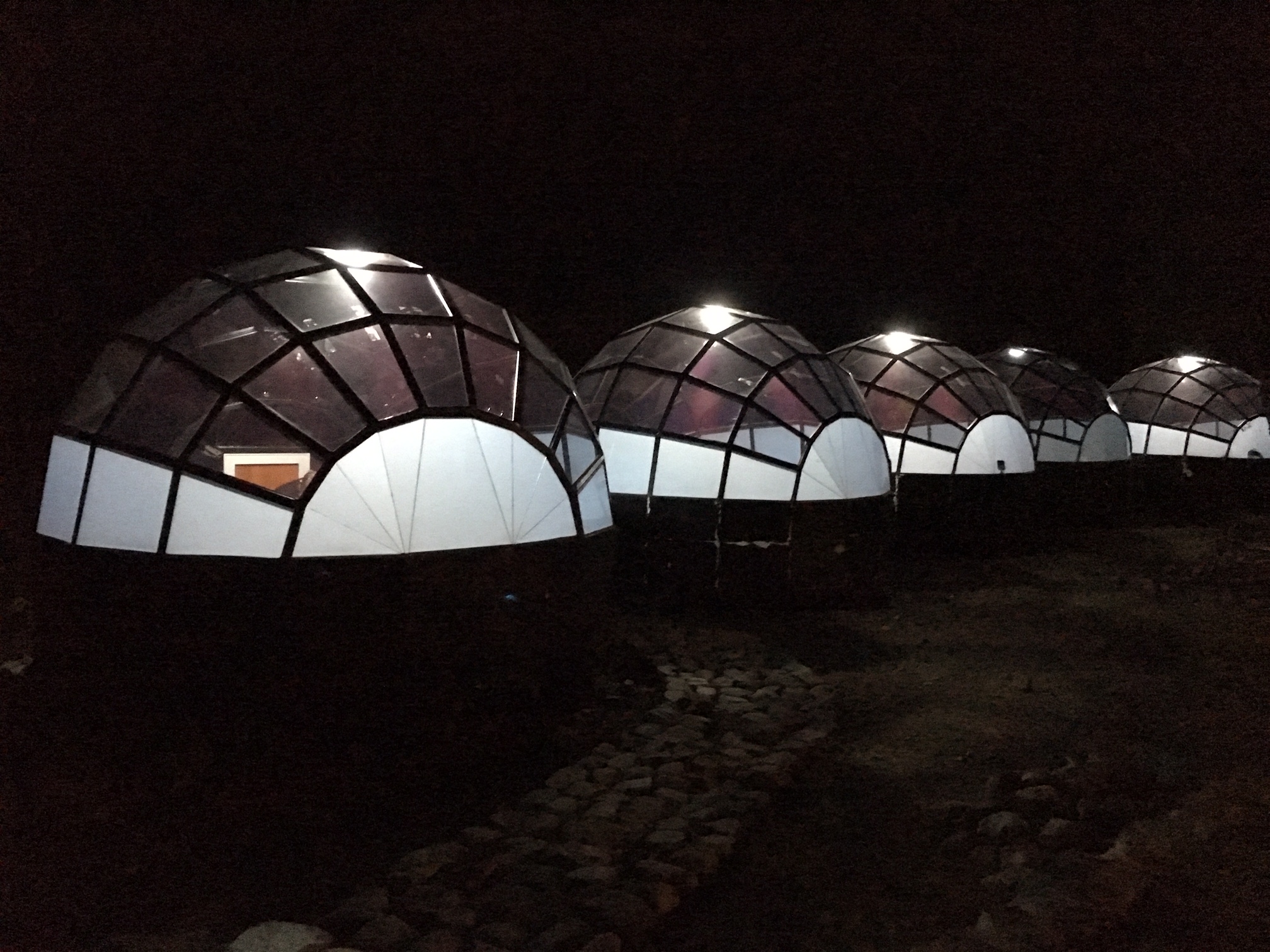 lite up sky camp domes at night