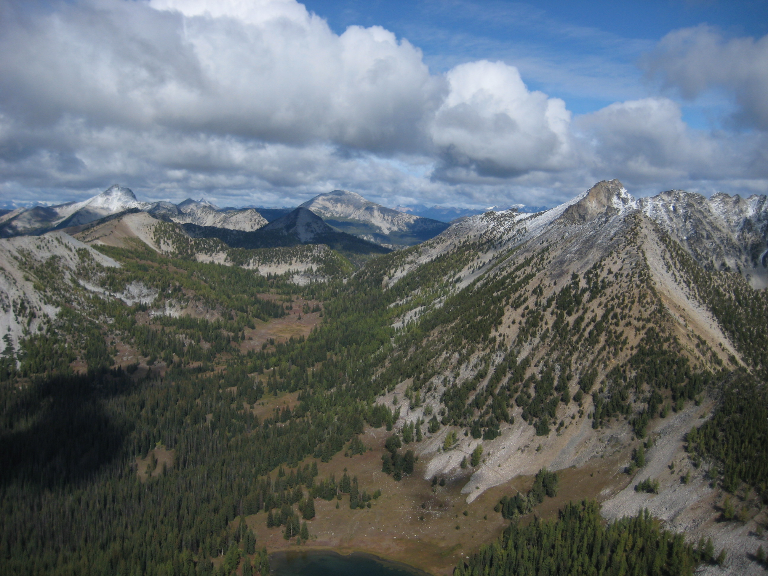 Star Peak, Oval Peak, and Mt Bigelow with fall colored basin as seen from Cheops Peak in the Sawtooth Mountains