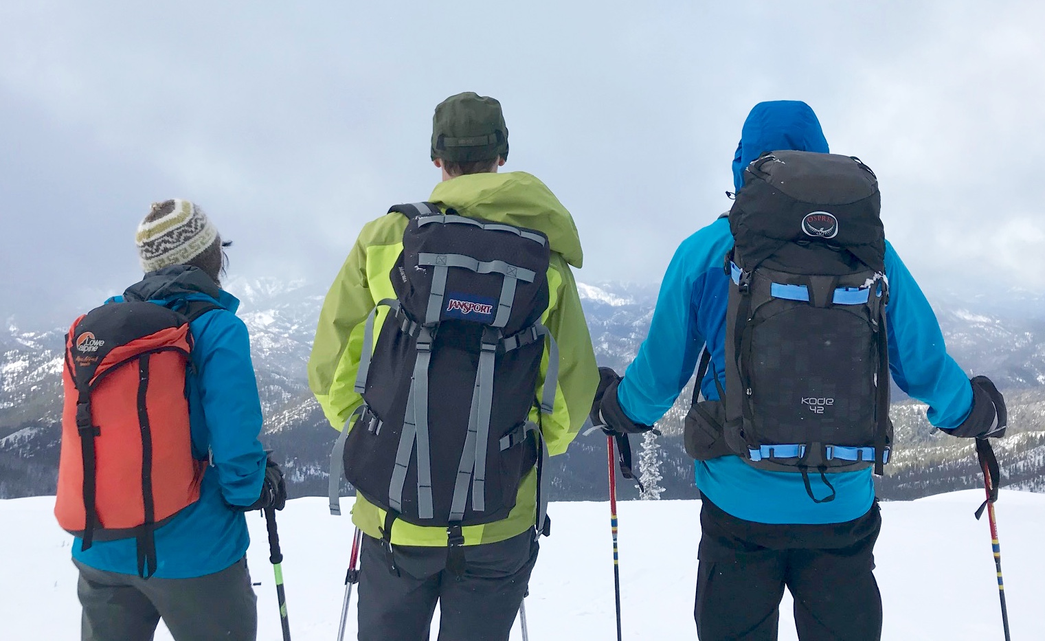skiers standing on the summit of Tronsen Head in the Lower Wenatchee Mountains