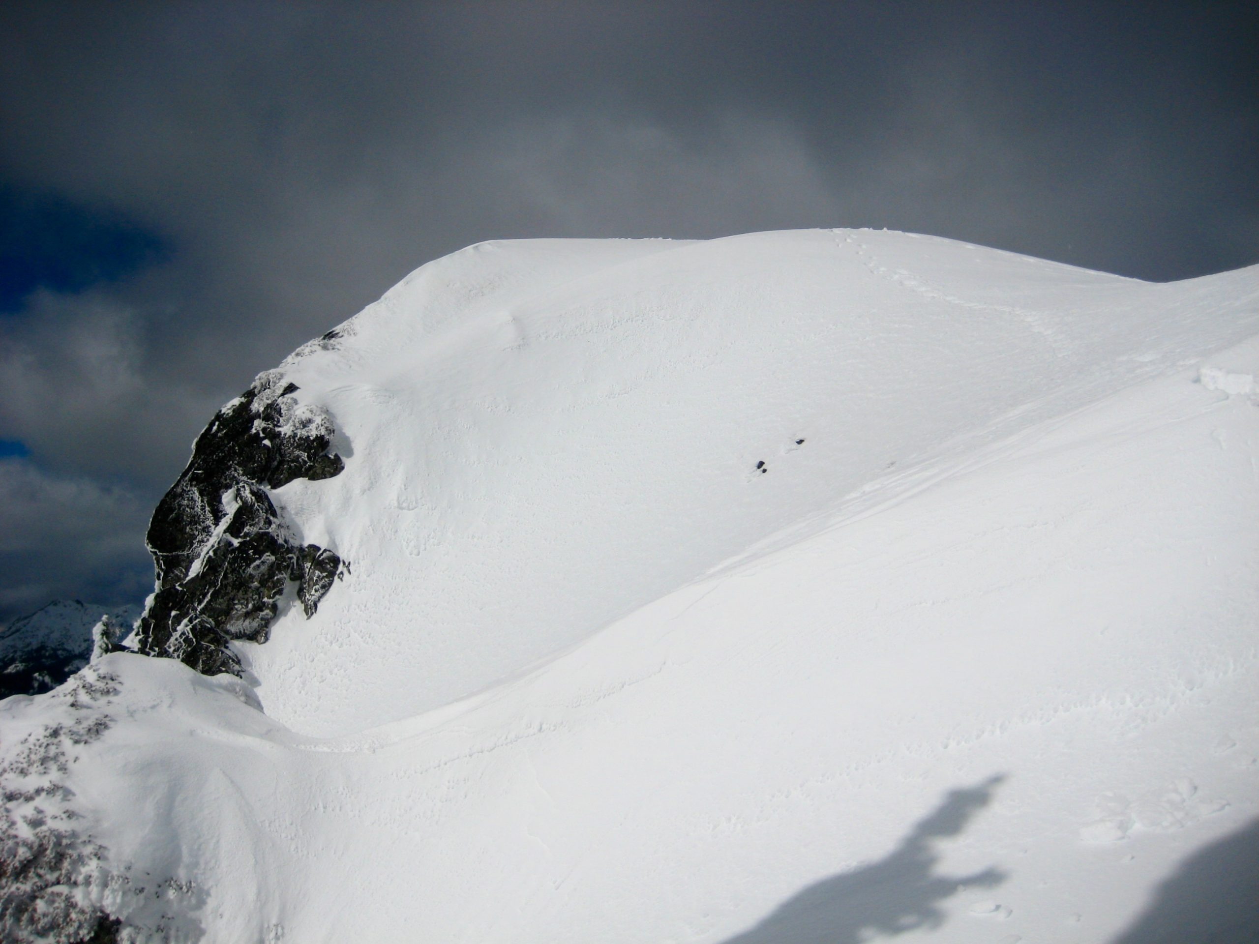 Looking back at the summit knob of Mt Laura from the south ridge