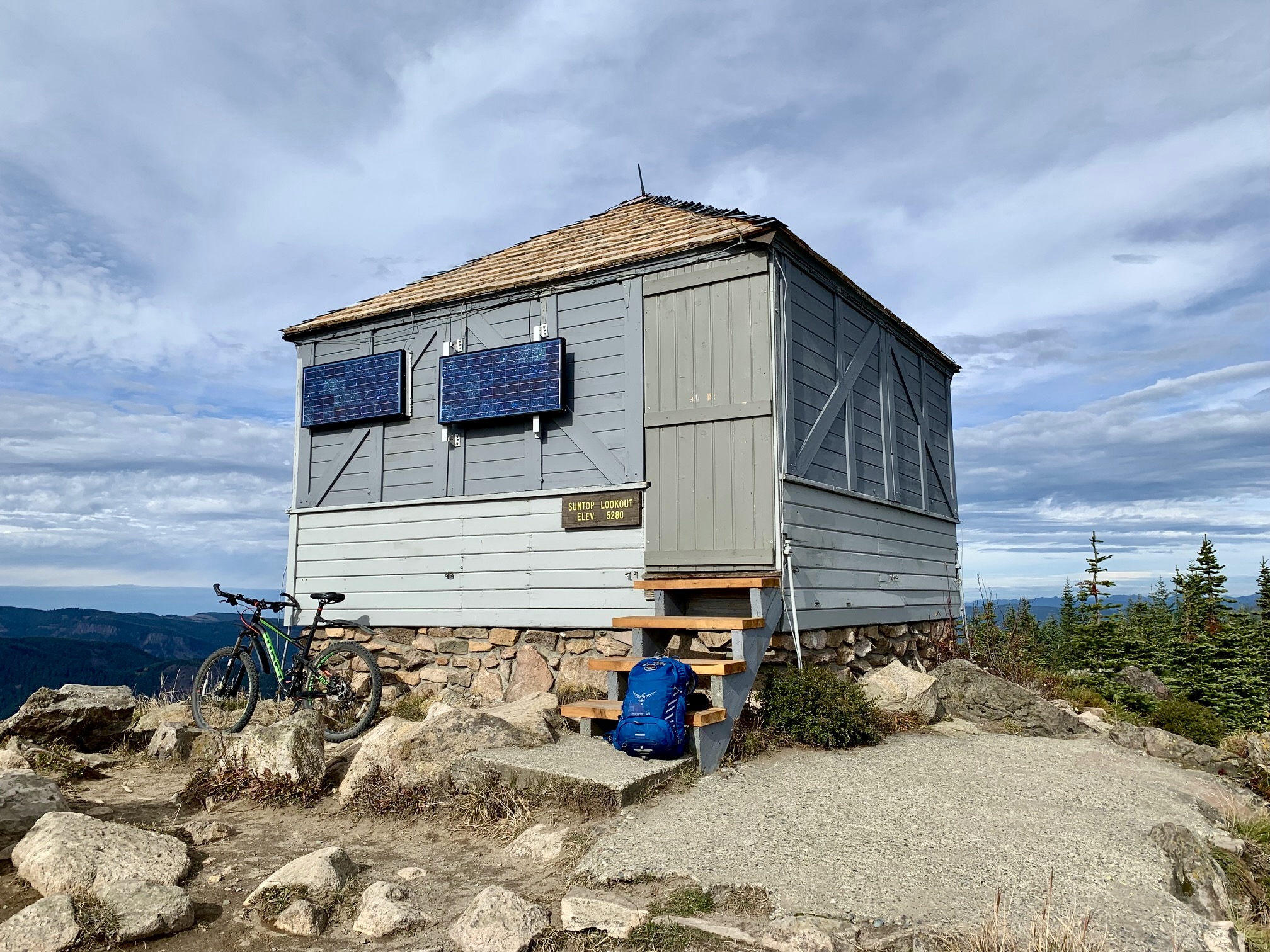 An old fire lookout cabin sits on the summit of Sun Top in the Clearwater Mountains