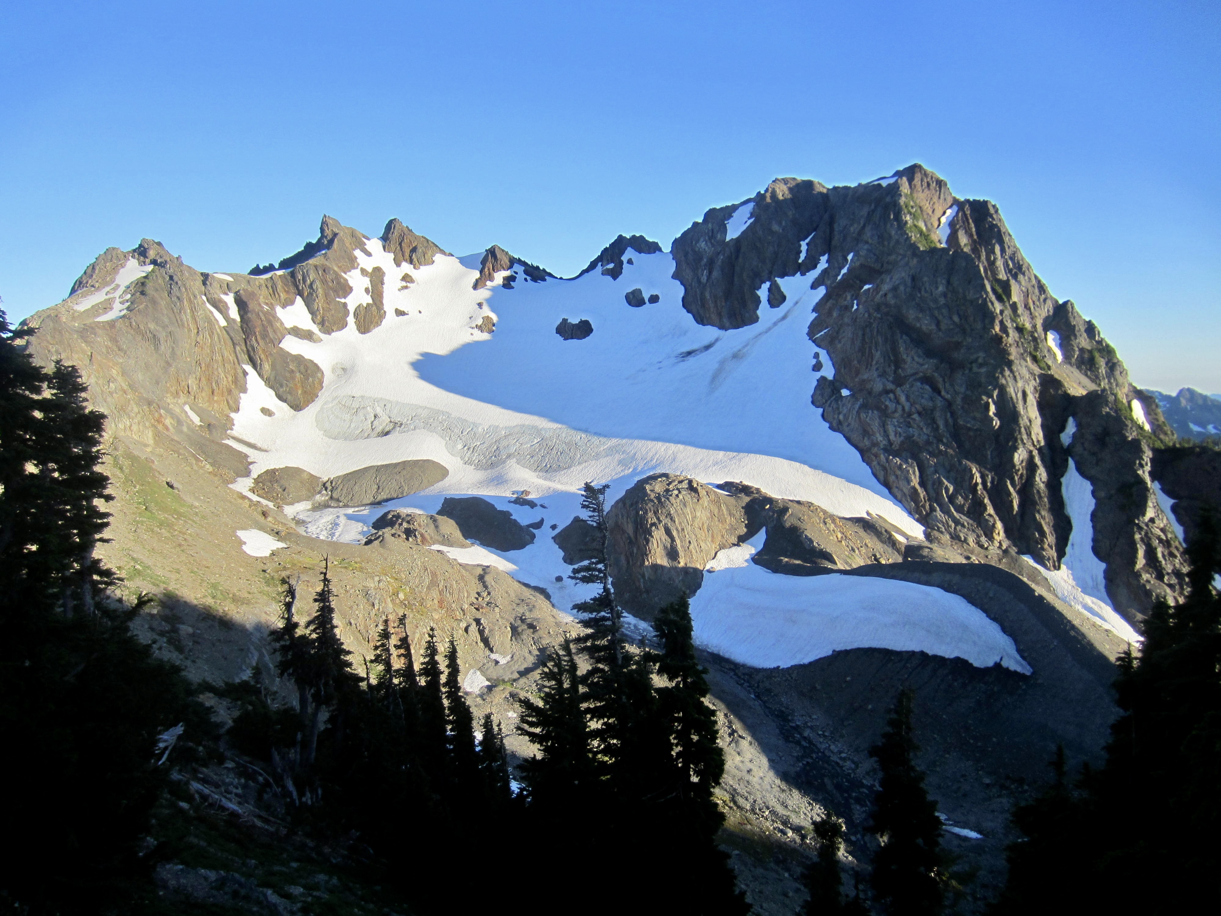Evening sun hits the north side of Mt. Christie in the Olympic Mountains of Washington