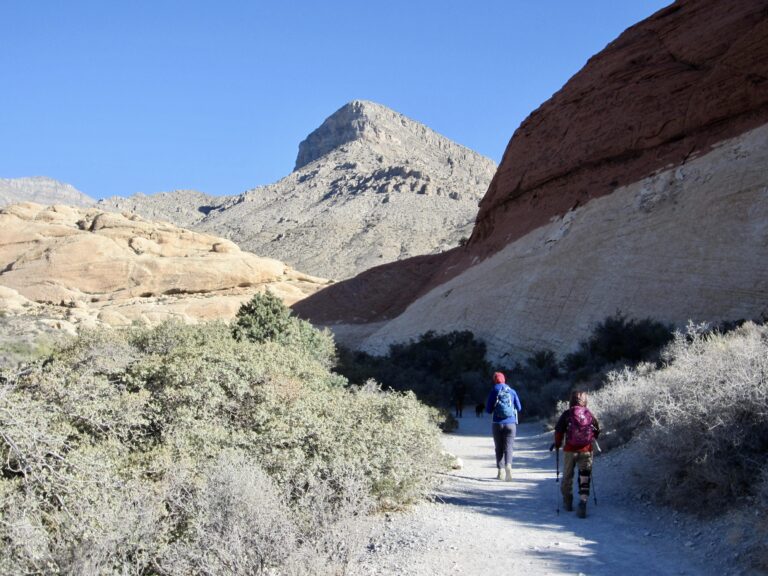 Two hikers approach Turtlehead Peak in Red Rock Canyon, Nevada