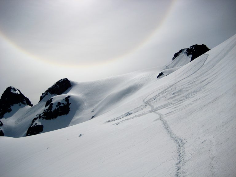 A solar halo hangs over a glacier on Whitehorse Mountain in the Cascade Range
