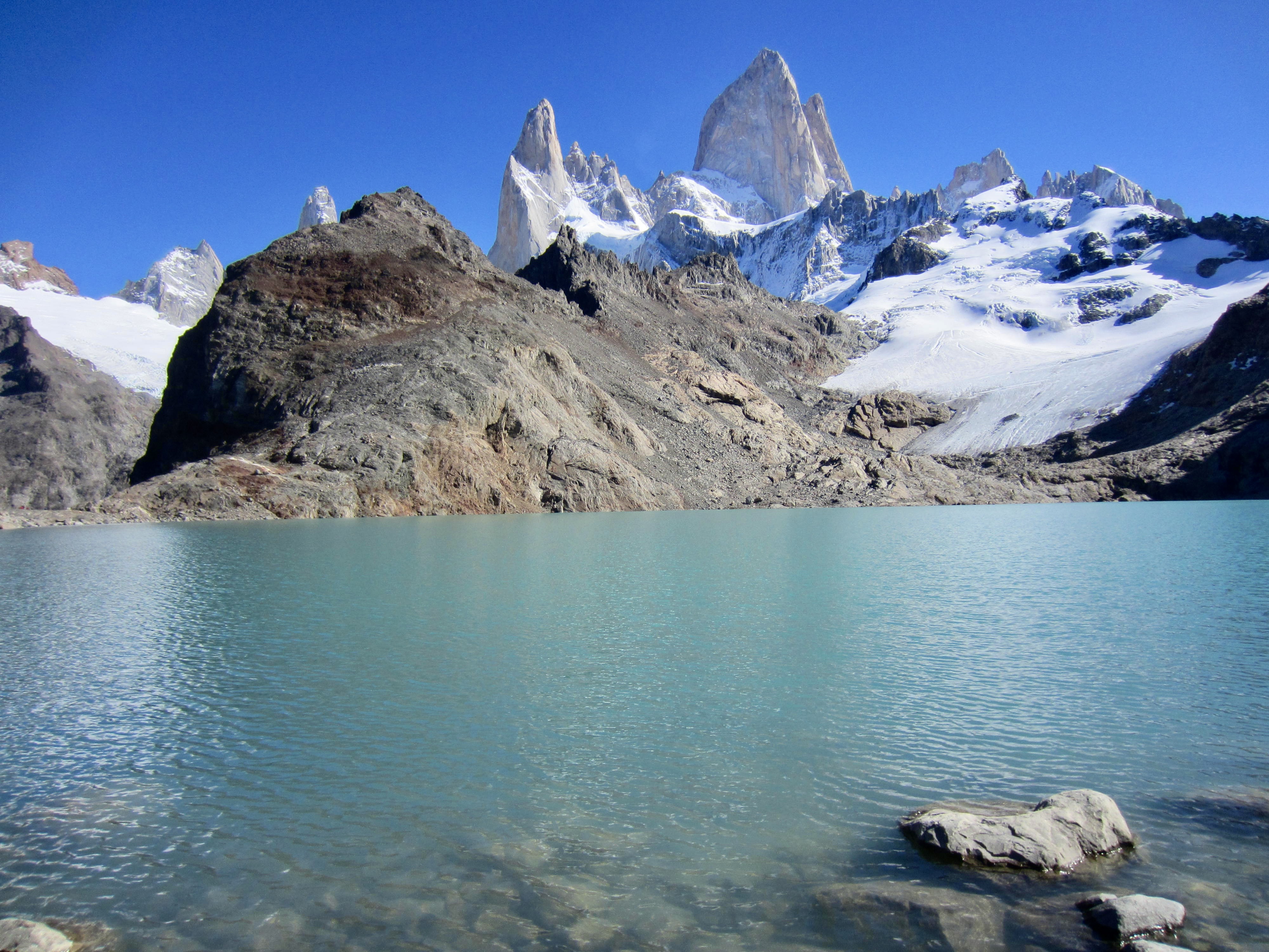 The Fitz Roy Massif stands above Lake de Los Tres in Patagonia Argentina