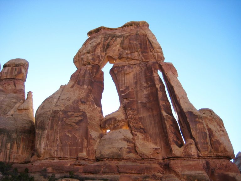 Looking at the immense structure of Druid Arch located at the head of Elephant Canyon in the Needles District of Canyonlands National Park Utah