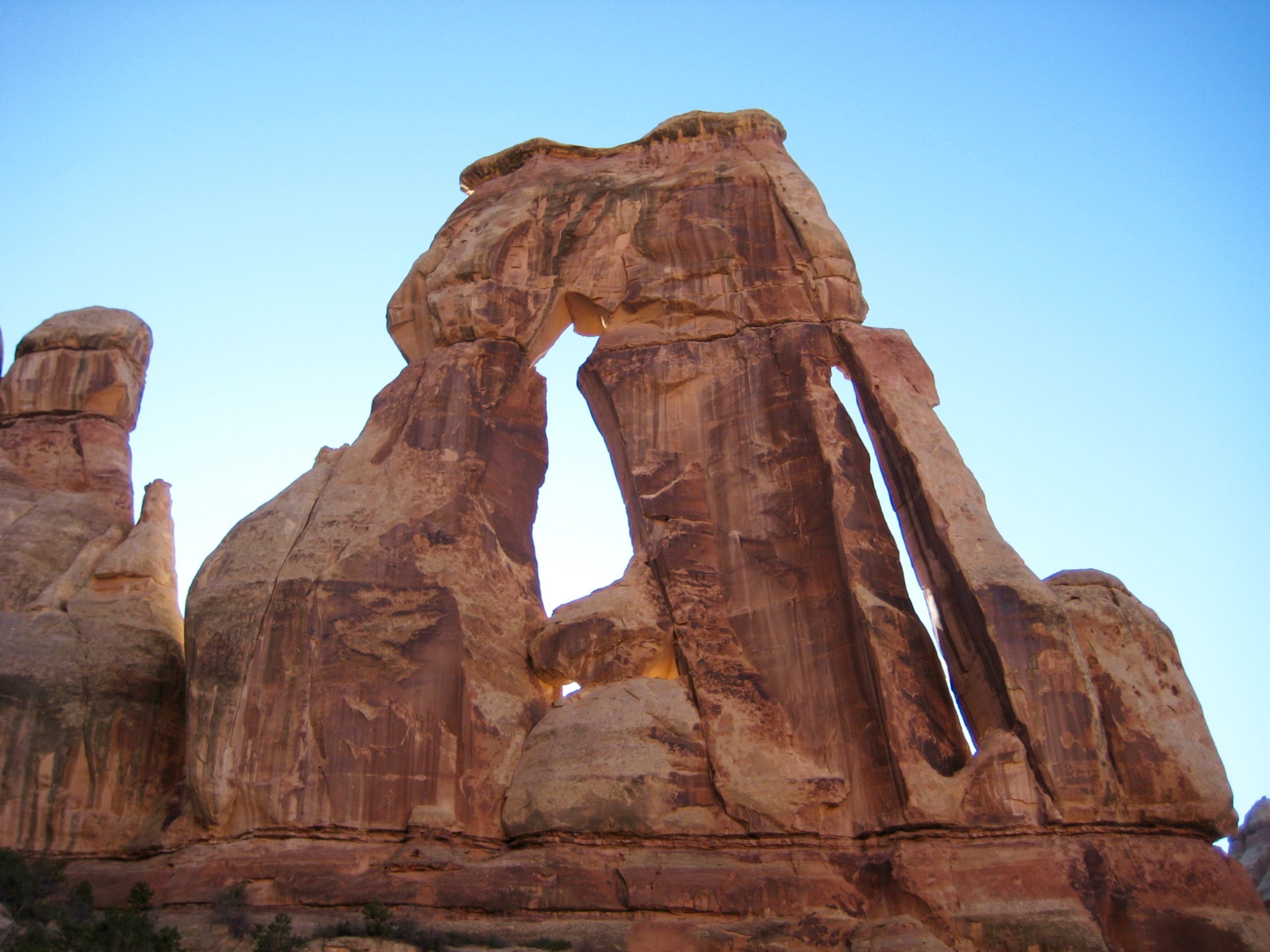 Looking at the immense structure of Druid Arch located at the head of Elephant Canyon in the Needles District of Canyonlands National Park Utah