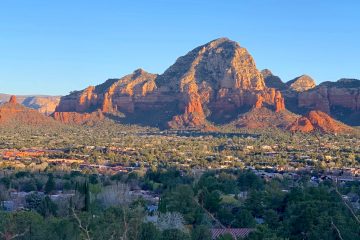Morning sun lights up rocky Capitol Butte in Sedona, Arizona.
