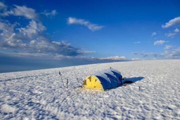 A vintage Omnipotent sits on the summit plateau of Mt Baker in the Washington Cascades